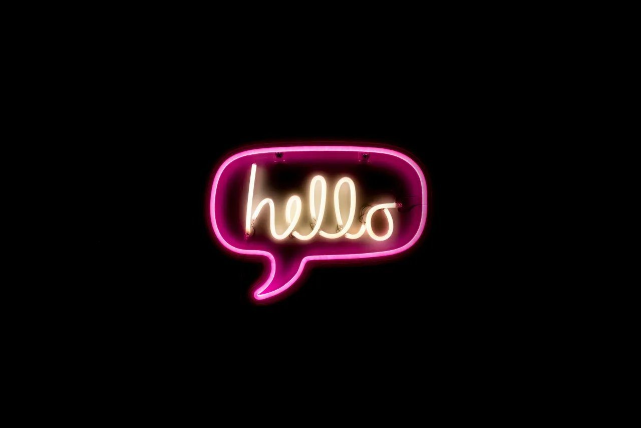 Neon 'hello' speech bubble sign